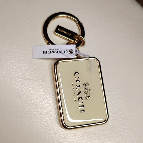 Coach Gold and Cream Keychain - Picture 1 of 2